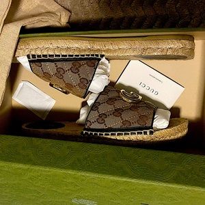 Gorgeous Authentic Gucci Slides with original dust bags and box